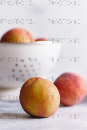 Peaches with colander