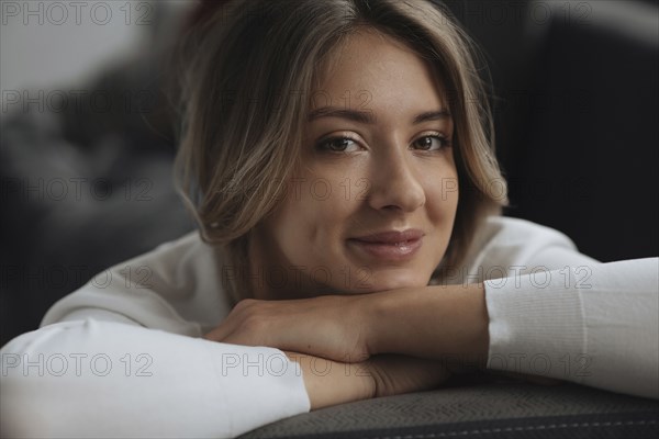 Portrait of young woman wearing natural make-up