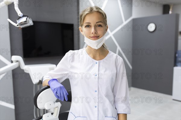 Dental assistant in dentist's surgery