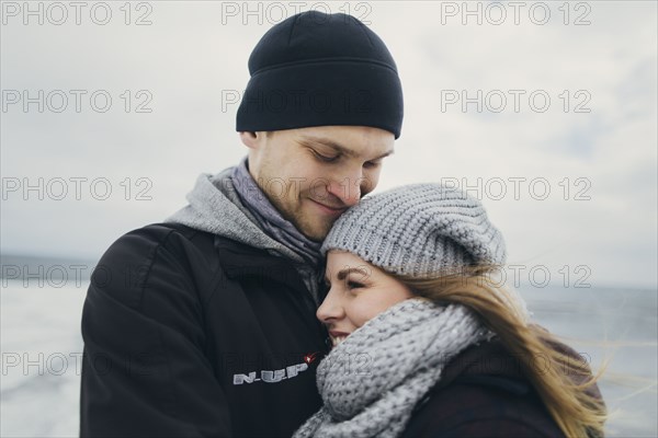 Young couple wearing warm clothing