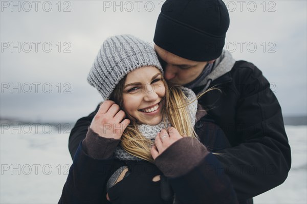 Young couple wearing warm clothing