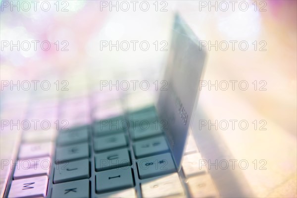 Credit card on computer keyboard