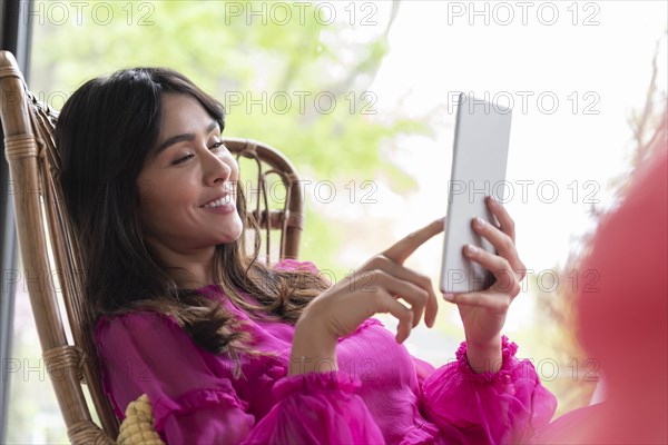 Woman using digital tablet