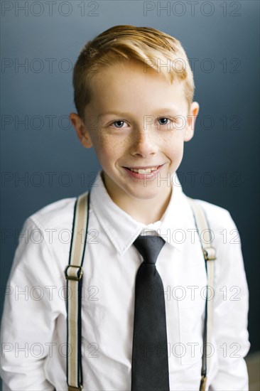 Portrait of smiling boy wearing tie