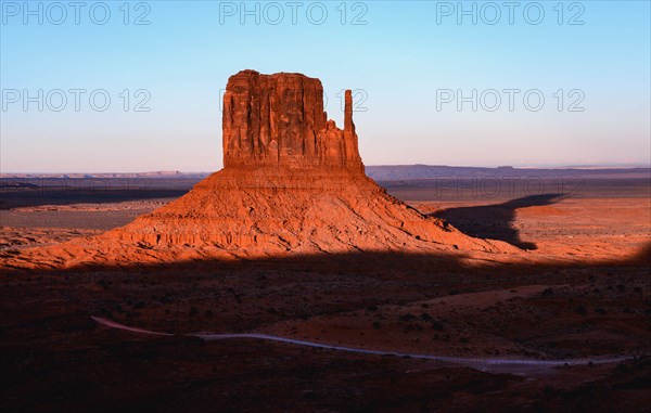 Butte at sunset in Monument Valley, Arizona, USA