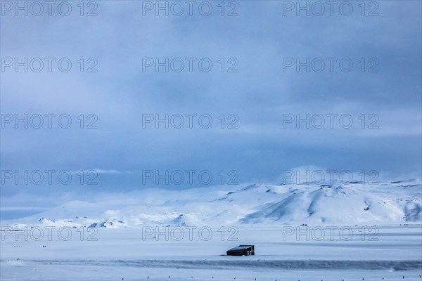 Field and mountain during winter in Fairfield, Idaho