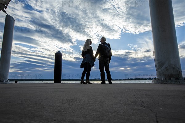 Couple by Potomac River in Washington DC, USA