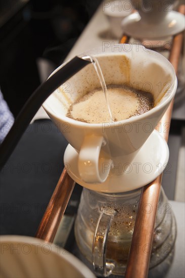 Water being poured into filter coffee