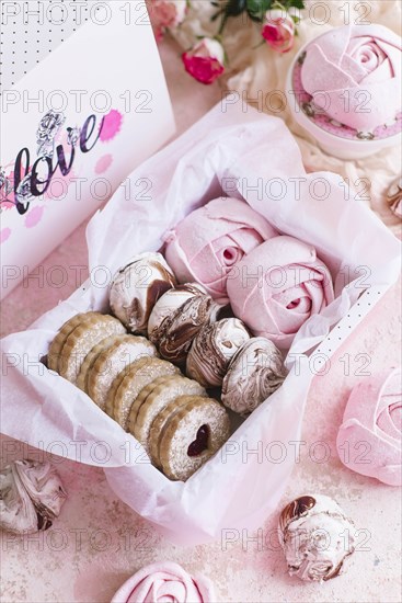 Pink box of biscuits and candy