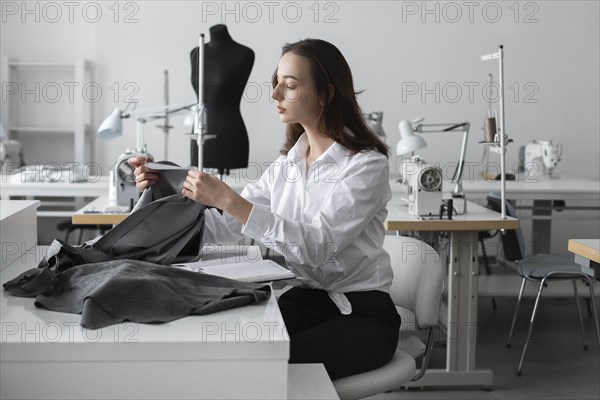 Fashion designer working in studio