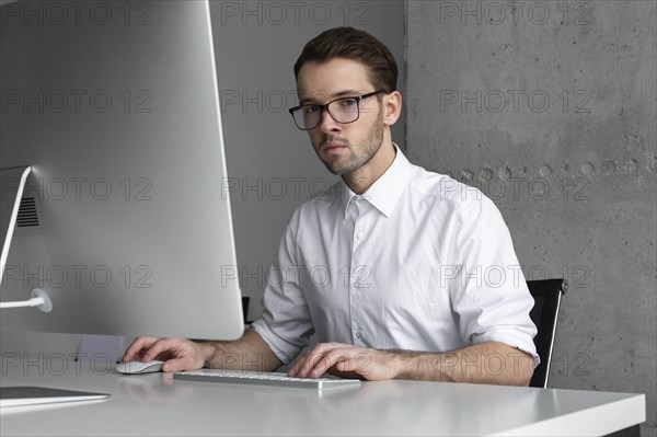 Businessman sitting at desk