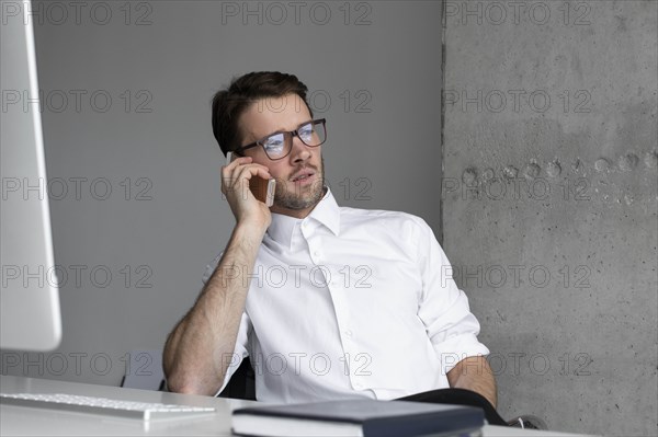 Businessman talking on phone