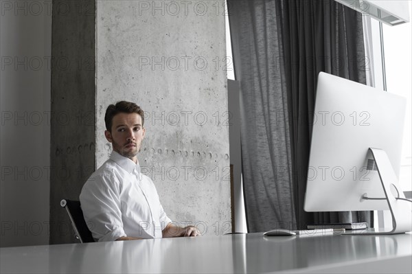 Businessman sitting at desk