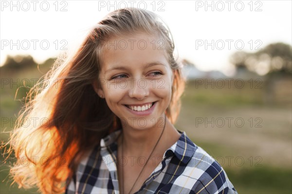 Portrait of smiling young woman