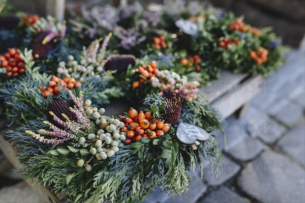 Christmas wreaths on pallet