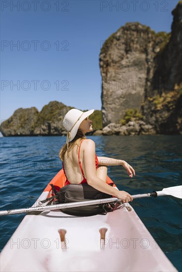 Young woman in kayak on sea in Krabi, Thailand