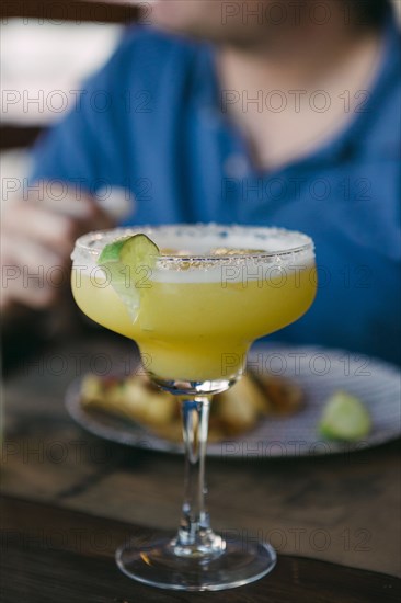 Margarita with lime garnish