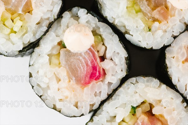 Sushi with raw fish and mayonnaise