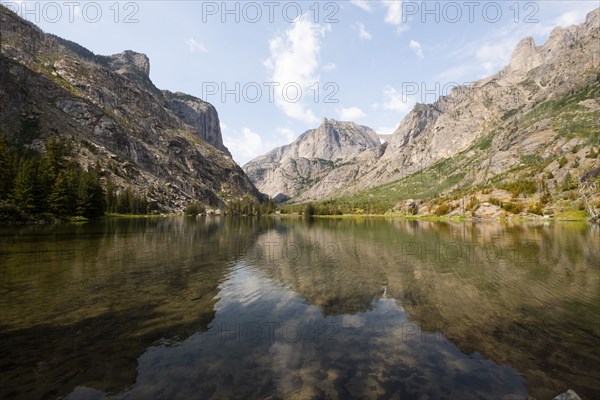Mountain reflected in river in Montana, USA