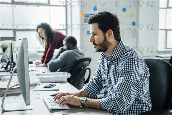 Man using computer in office