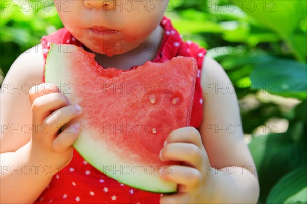 Girl eating watermelon