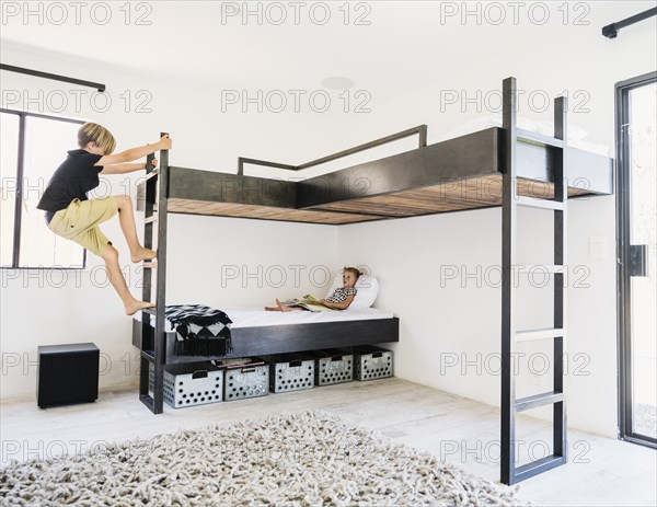 Siblings on bunk beds