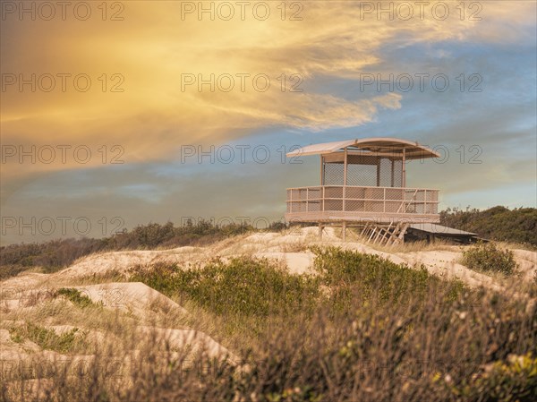 Lifeguard hut at sunset