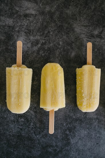 Row of lemon ice pops