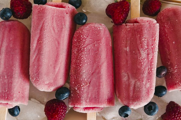 Berry ice pops with berries