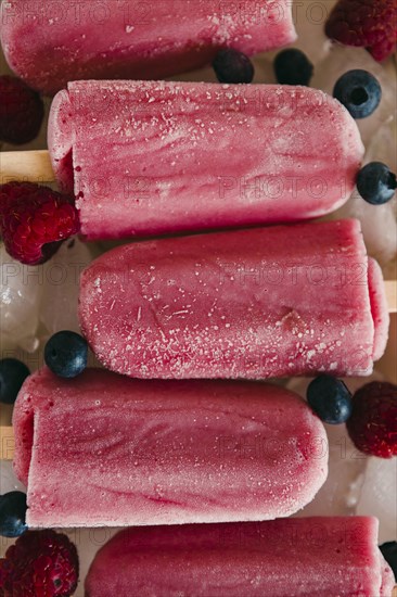 Berry ice pops with berries