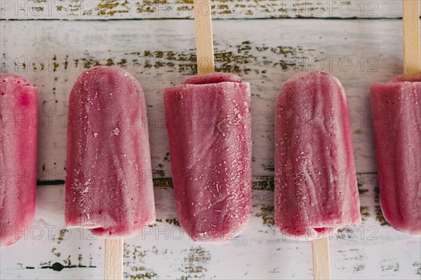 Row of berry ice pops