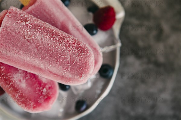 Berry ice pops with berries