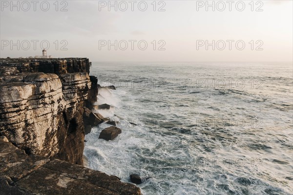 Building on cliff by sea in Peniche