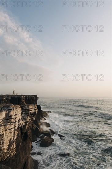 Building on cliff by sea in Peniche