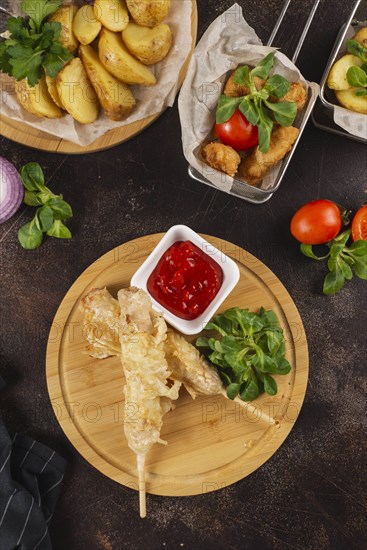 Deep fried food with tomato sauce