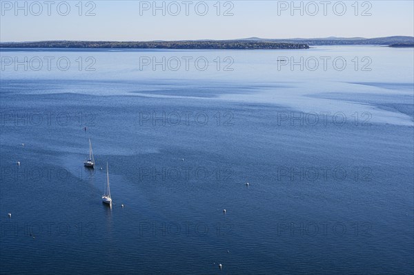 Sailboats at sea in Acadia National Park, Maine, USA