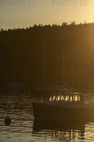 Boat at sunset in Seal Harbor, Mount Desert Island, USA