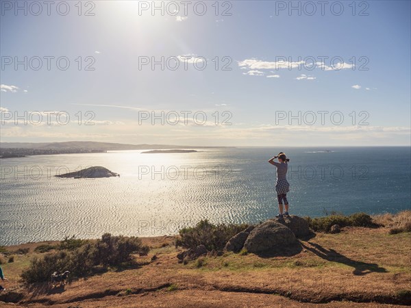 Woman looking at view of Victor Harbor, South Australia, Australia