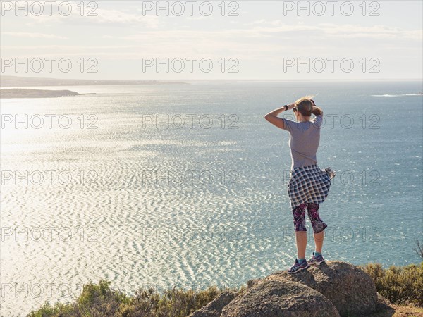 Woman looking at view of Victor Harbor, South Australia, Australia