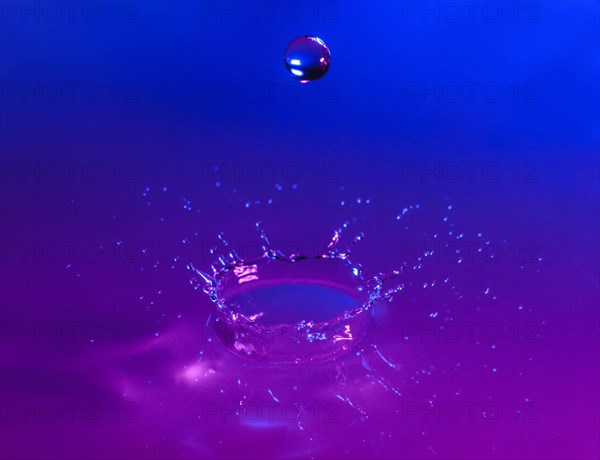 Purple and blue splashing water