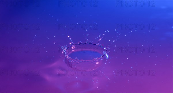 Purple and blue splashing water