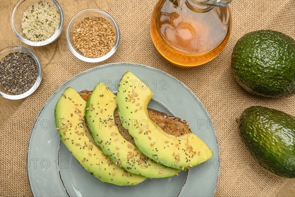 Sliced avocado on toast with seeds