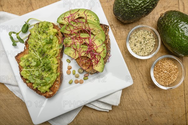 Avocado and bean sprouts on toast