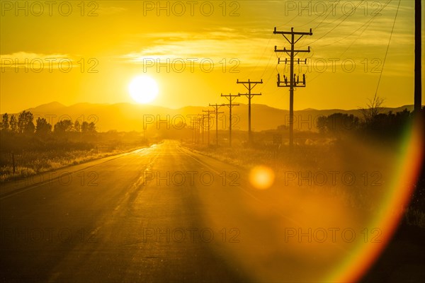 Sunset over country road in Picabo, Idaho, USA