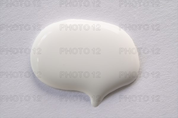 White paint in shape of speech bubble