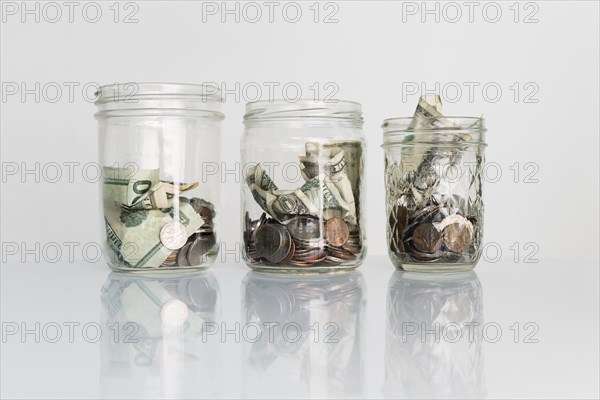 Money in glass jars