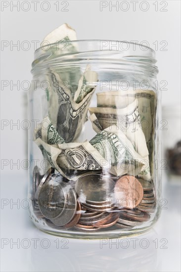 Money in glass jar