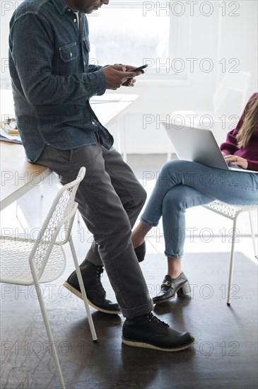 Colleagues working together in office