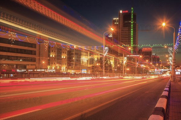 Light trails on road at night in Minsk, Belarus