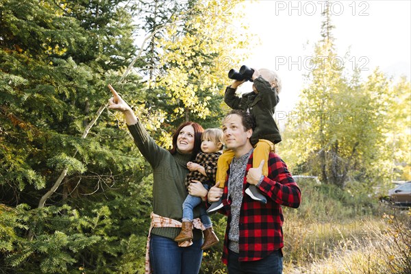 Family sightseeing in forest